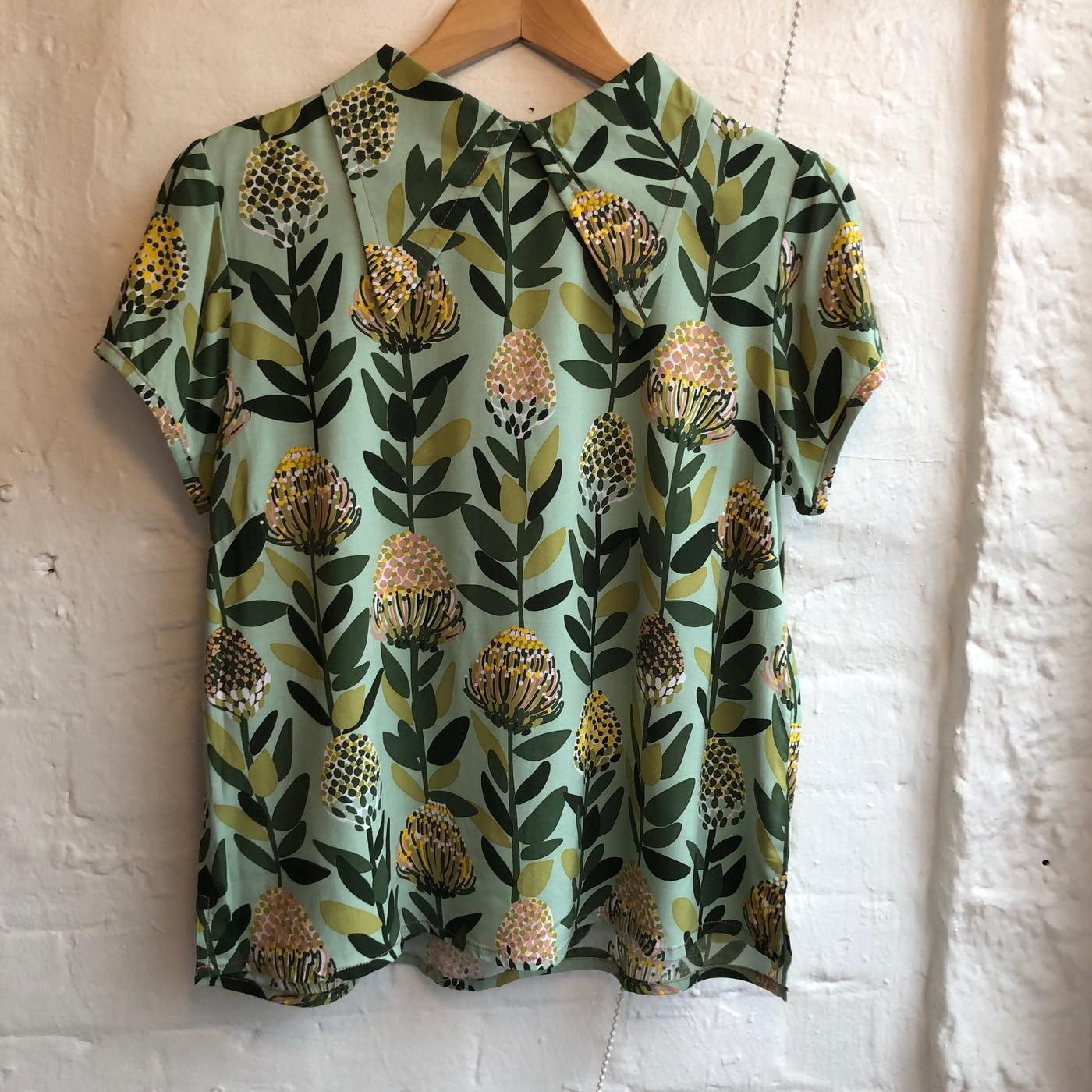 Protea Wing Collar Top