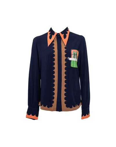 A classic button-up shirt with a sardine print, scalloped edging, and a wing collar, in navy and coral colors.