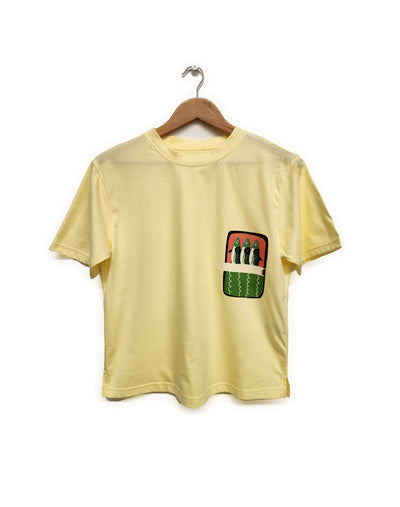 Yellow t-shirt with a graphic sardine can design on a hanger against a white background